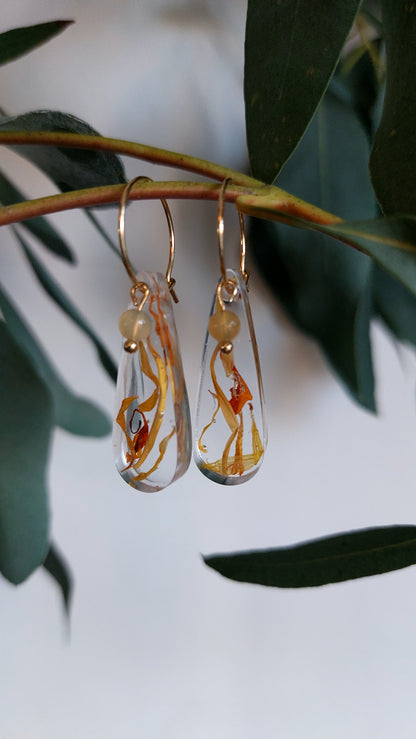 Florabelle oorbellen - Goudsbloem & Gele Opaal